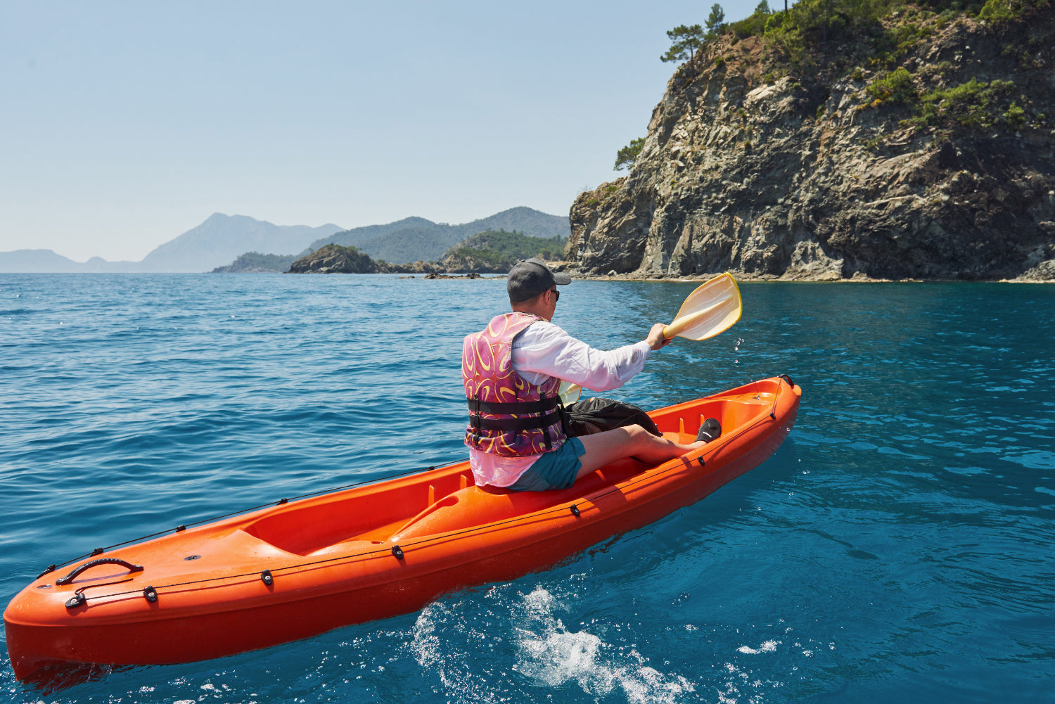 a man ocean kayaking